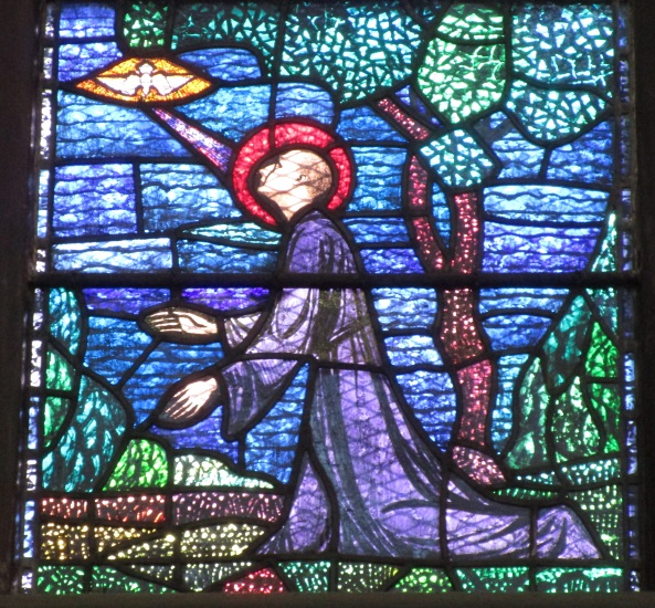 La conversione di Agostino e il tolle lege: vetrata della chiesa agostiniana di Dublino con scene agostiniane