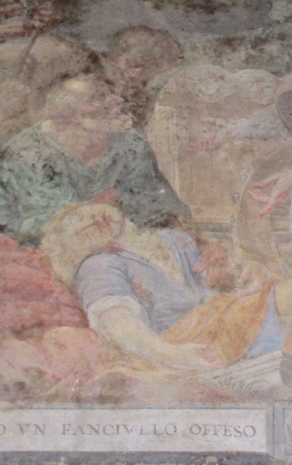 San Tommaso da Villanova risana un bambino schiacciato da un carro: particolare del ragazzo e del soccorritore