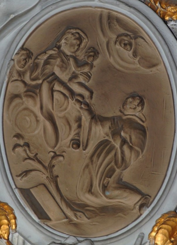 San Nicola da Tolentino riceve dei pani dalla Vergine