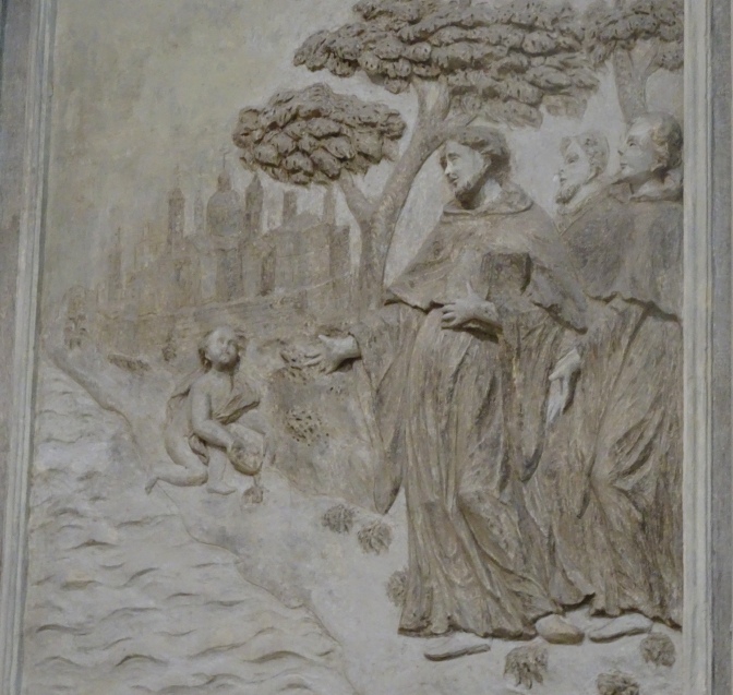 Agostino e il bambino in riva al mare