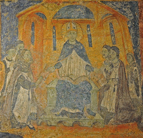 Agostino consegna la regola ai monaci: affresco a Llu nella chiesa di santa Maria