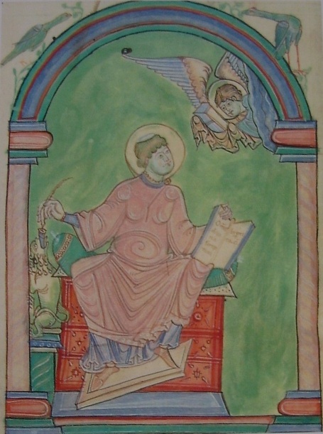 Agostino nel suo studio scrivi libri ispirato da un angelo dal MS 75 di Avranches