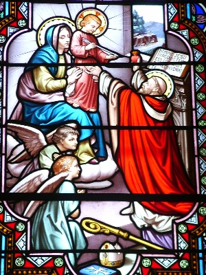 Vetrata di Bessac con Agostino ai piedi della vergine e di Ges Bambino