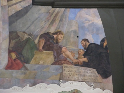 Affresco di Vaclav che raffigura Agostino che lava i piedi al Cristo pellegrino