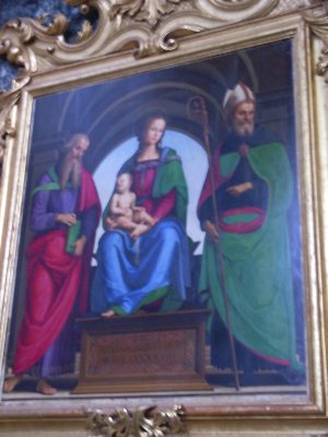 Madonna in Trono con i santi Giovanni Evangelista e S. Agostino del Perugino
